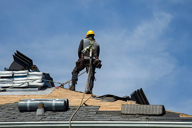 Professional Storm Damage Roof Repair technician working in Highland, MI